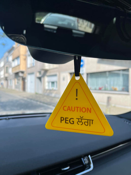 cintre de voiture punjabi 'Attention peg lagga