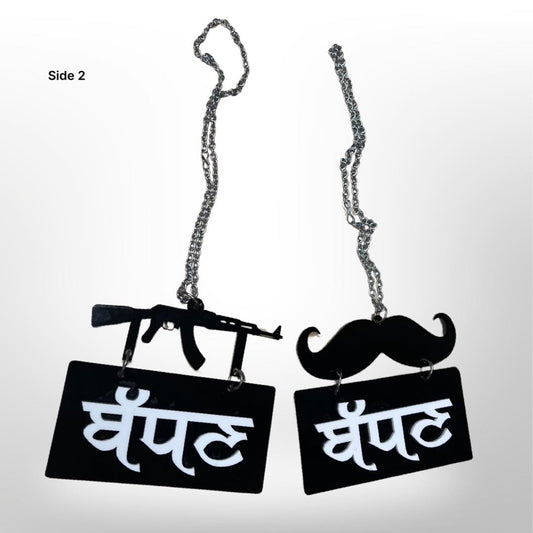 "Badhan" car hanger  - moustache/gun