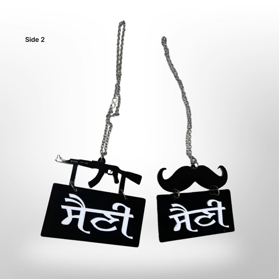 "Saini' car hanger - moustache/gun