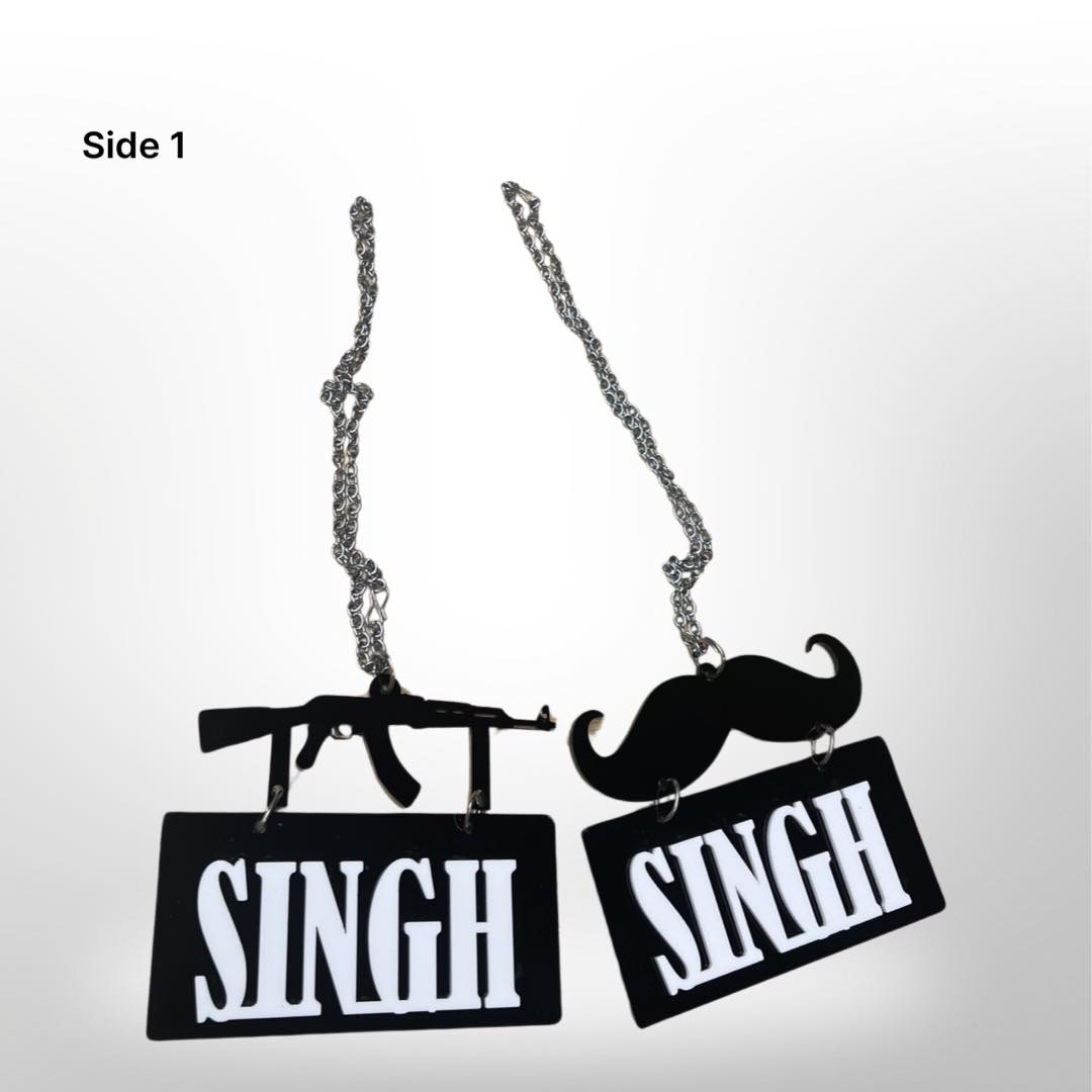 "Singh" car hanger - moustache/gun